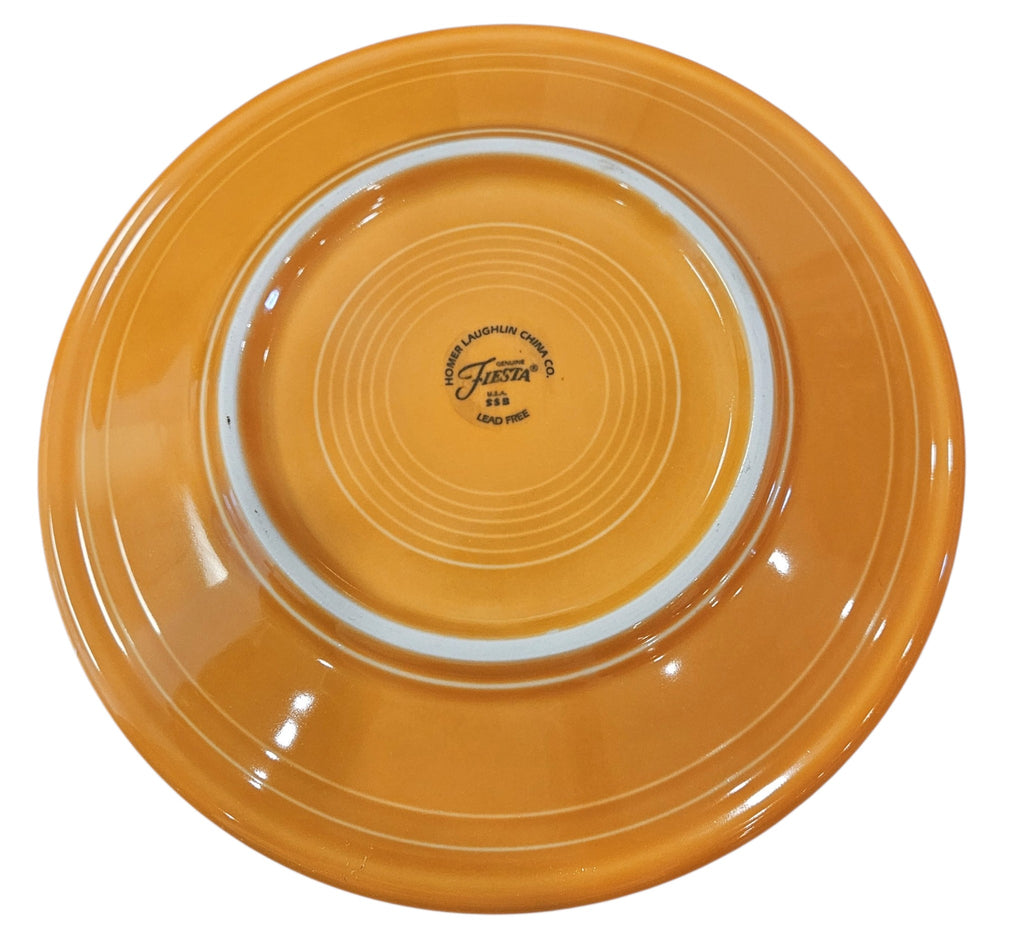 This is a Fiesta fiestaware Classic Luncheon Plate featuring the Carson's Exclusive Pumpkin decal on tangerine. Lead free, Post 1986 retired decal, retired color, Halloween
