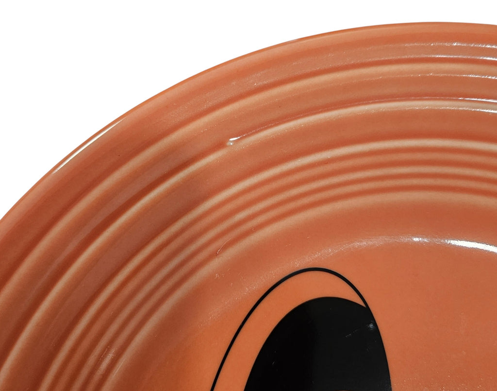 This is a Fiesta fiestaware Classic Luncheon Plate featuring the Carson's Exclusive Pumpkin decal on persimmon. Lead free, Post 1986 retired decal, retired color, Halloween
