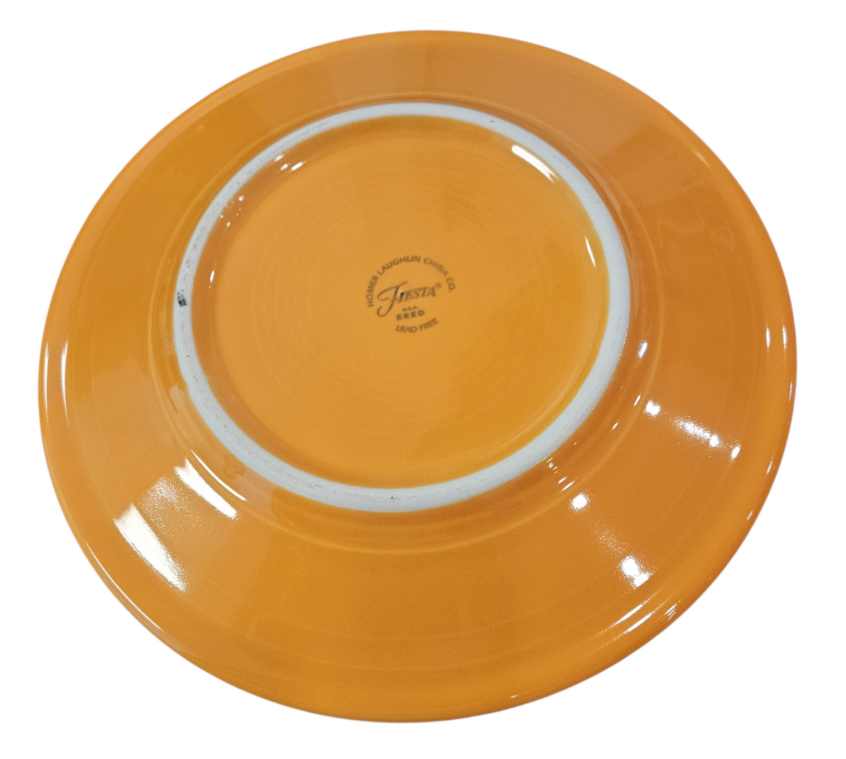 This is a Fiesta fiestaware Classic Luncheon Plate featuring the Happy Pumpkin decal on tangerine. Lead free, Post 1986, Retired Production Decal, Retired Color, Fall, Thanksgiving, Halloween
