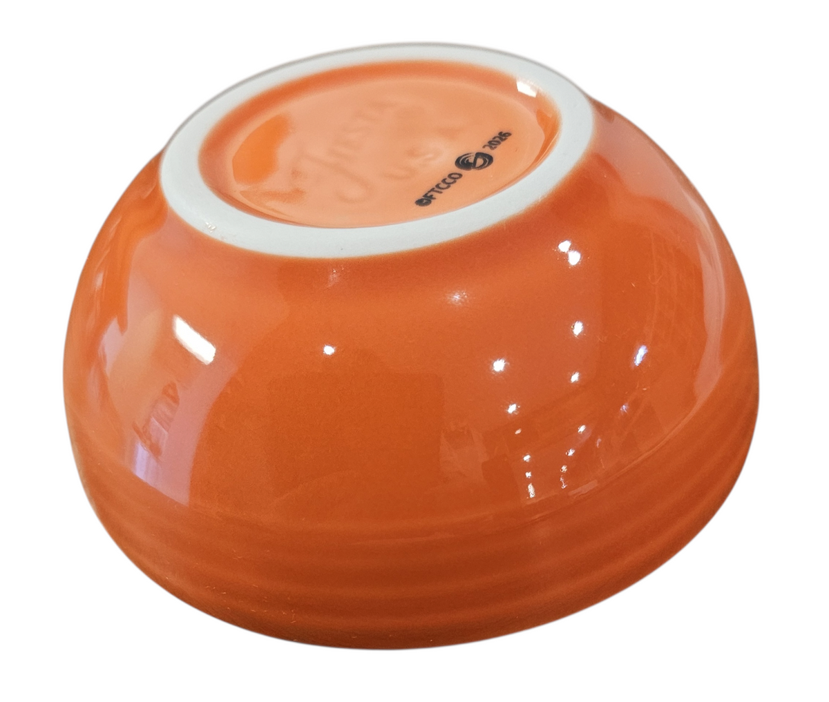 This is a Fiesta fiestaware Mini Bowl featuring the FTCCO 2026 exclusive Happy Pumpkin decal on poppy. Lead free, Post 1986, Fall, Thanksgiving, Halloween
