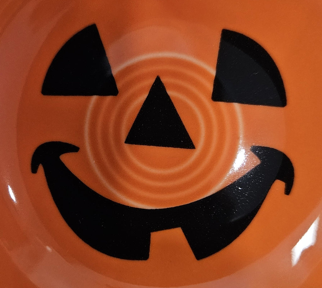 This is a Fiesta fiestaware Mini Bowl featuring the FTCCO 2026 exclusive Happy Pumpkin decal on poppy. Lead free, Post 1986, Fall, Thanksgiving, Halloween
