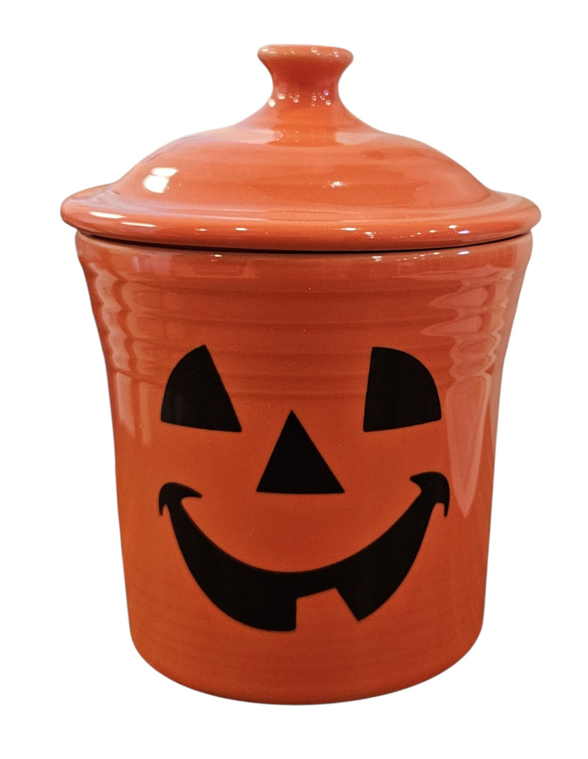 This is a Fiesta fiestaware Jam Jar Small Canister with lid featuring the FTCCO exclusive Happy Pumpkin decal on poppy. Lead free, Post 1986, Fall, Thanksgiving, Halloween
