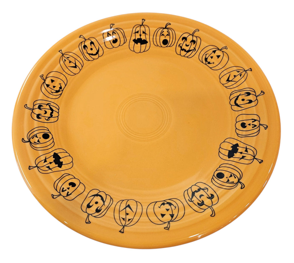 This is a Fiesta fiestaware Classic Luncheon Plate featuring the Carson's Exclusive Jack O' Lanterns decal on tangerine. Lead free, Post 1986 retired decal, retired color, Halloween
