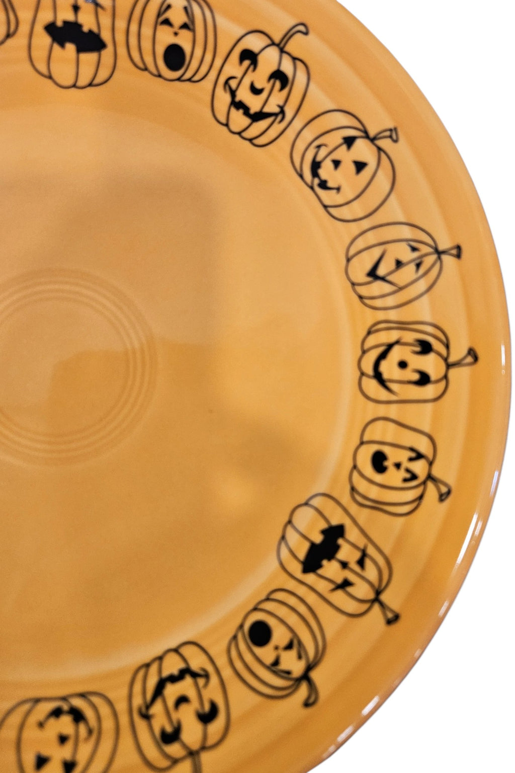 This is a Fiesta fiestaware Classic Luncheon Plate featuring the Carson's Exclusive Jack O' Lanterns decal on tangerine. Lead free, Post 1986 retired decal, retired color, Halloween
