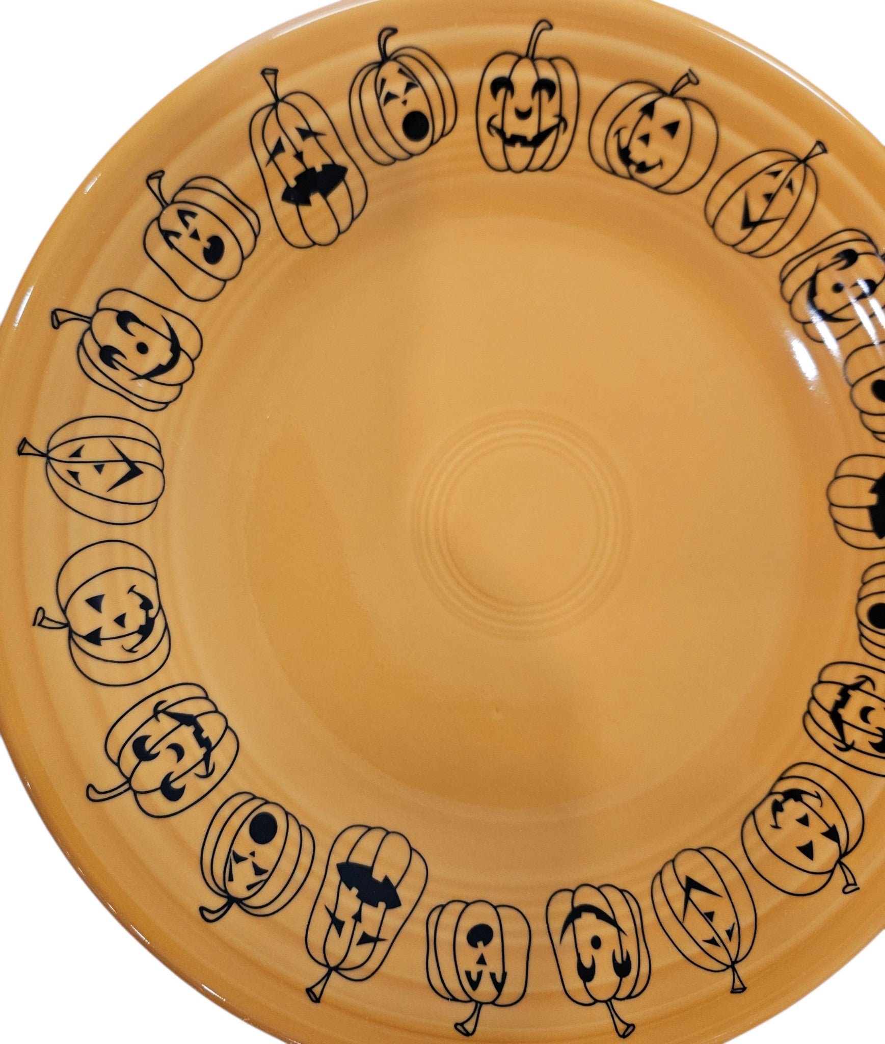 This is a Fiesta fiestaware Classic Luncheon Plate featuring the Carson's Exclusive Jack O' Lanterns decal on tangerine. Lead free, Post 1986 retired decal, retired color, Halloween
