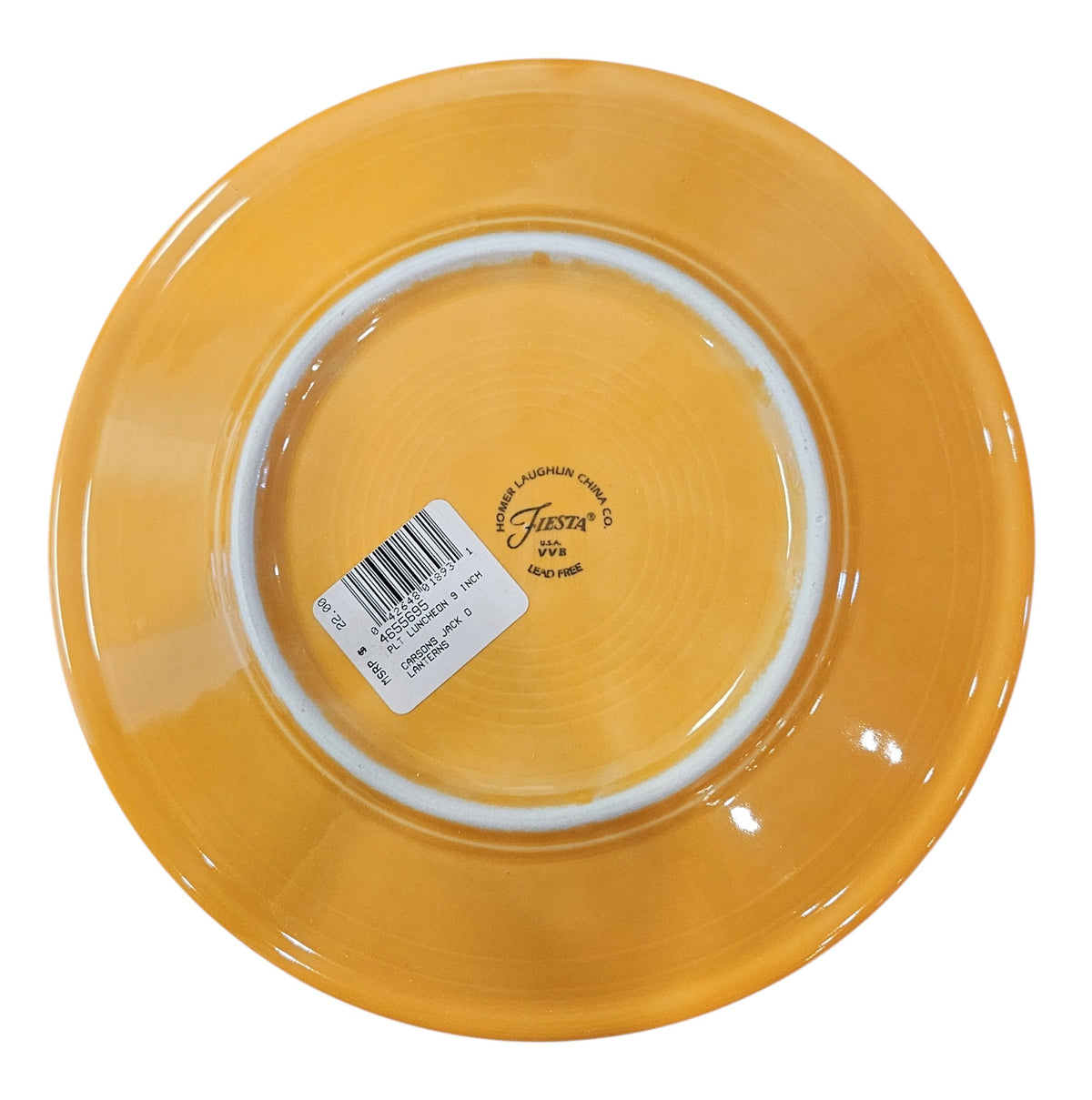 This is a Fiesta fiestaware Classic Luncheon Plate featuring the Carson's Exclusive Jack O' Lanterns decal on tangerine. Lead free, Post 1986 retired decal, retired color, Halloween
