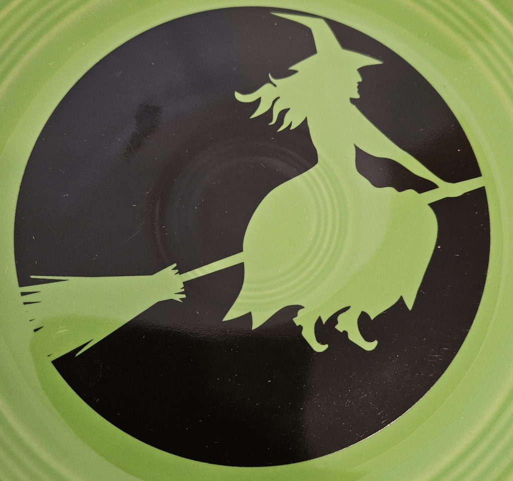 This is a Fiesta fiestware classic luncheon plate featuring the Moon Lit Witch decal on shamrock. Lead free Post 1986 Retired Color, Retired Decal, Halloween

