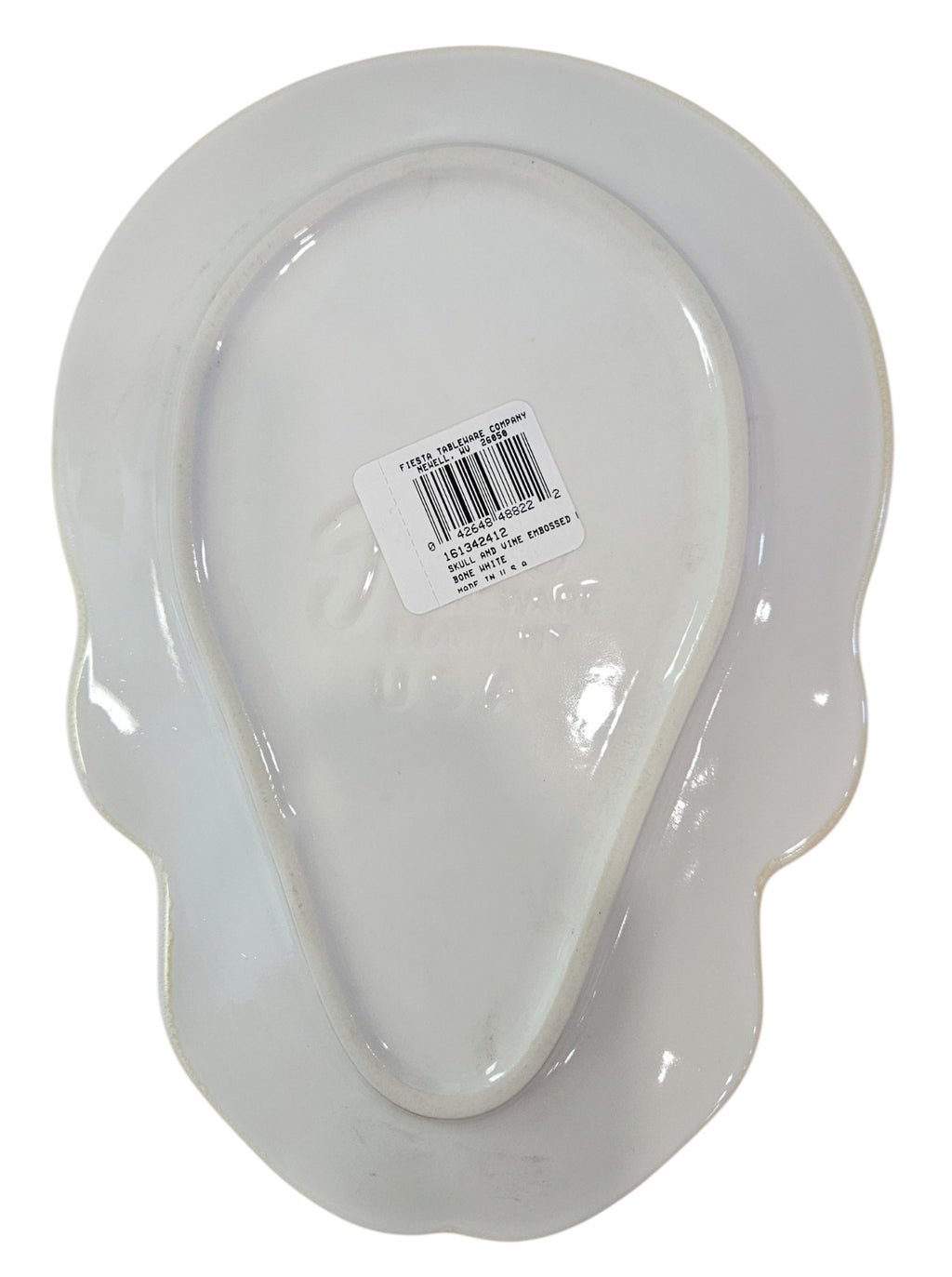 This is Fiesta fiestware Embossed Skull & Vine Skull shaped plate on white. Lead free, post 1986,  retired shape, Halloween, Hard to Find 
