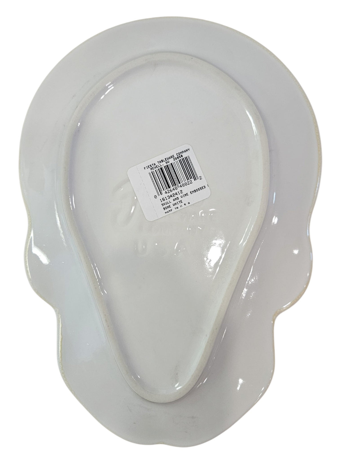 This is Fiesta fiestware Embossed Skull & Vine Skull shaped plate on white. Lead free, post 1986,  retired shape, Halloween, Hard to Find 
