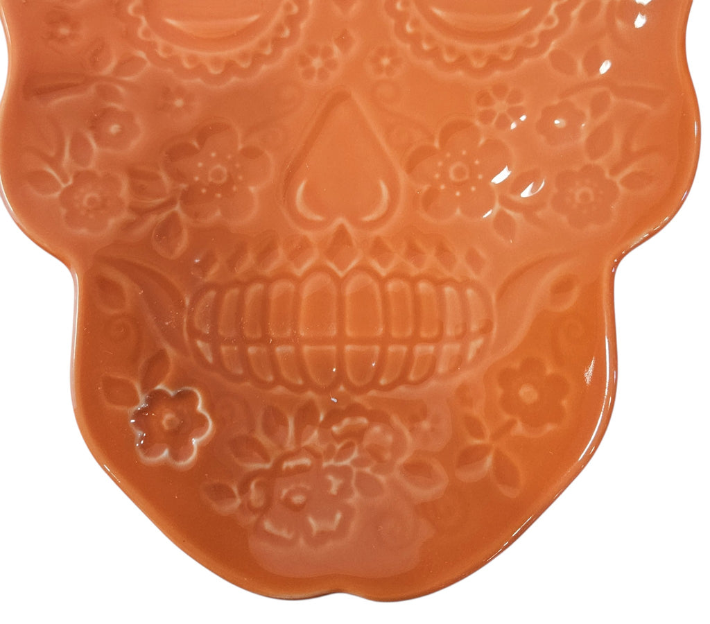 This is Fiesta fiestware Embossed Skull & Vine Skull shaped plate on poppy. Lead free, post 1986,  retired shape, Halloween, Factory Outlet Exclusive, Rare, Hard to Find 
