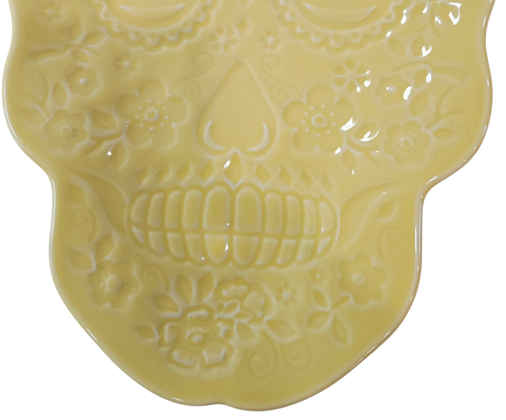 This is Fiesta fiestware Embossed Skull & Vine Skull shaped plate on sunflower. Lead free, post 1986,  retired color, retired shape, Halloween, Factory Outlet Exclusive, Rare, Hard to Find 
