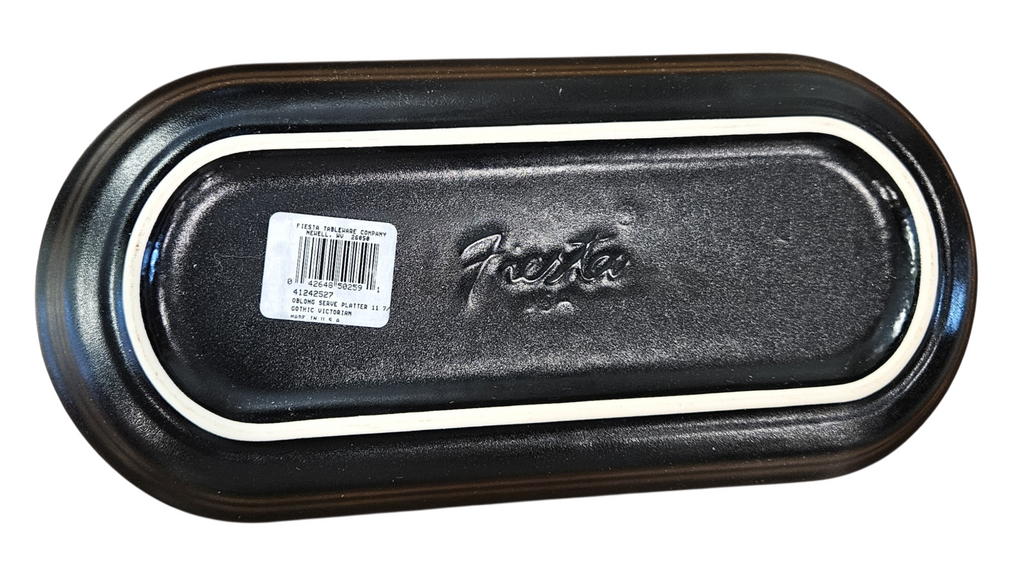 This is a Fiesta Fiestaware Bread Tray featuring the Gothic Victorian decal on Foundry/Black. lead-free, Post 1986, Retired Decal Limited Production Color Skull Halloween Rosebud Butterfly
