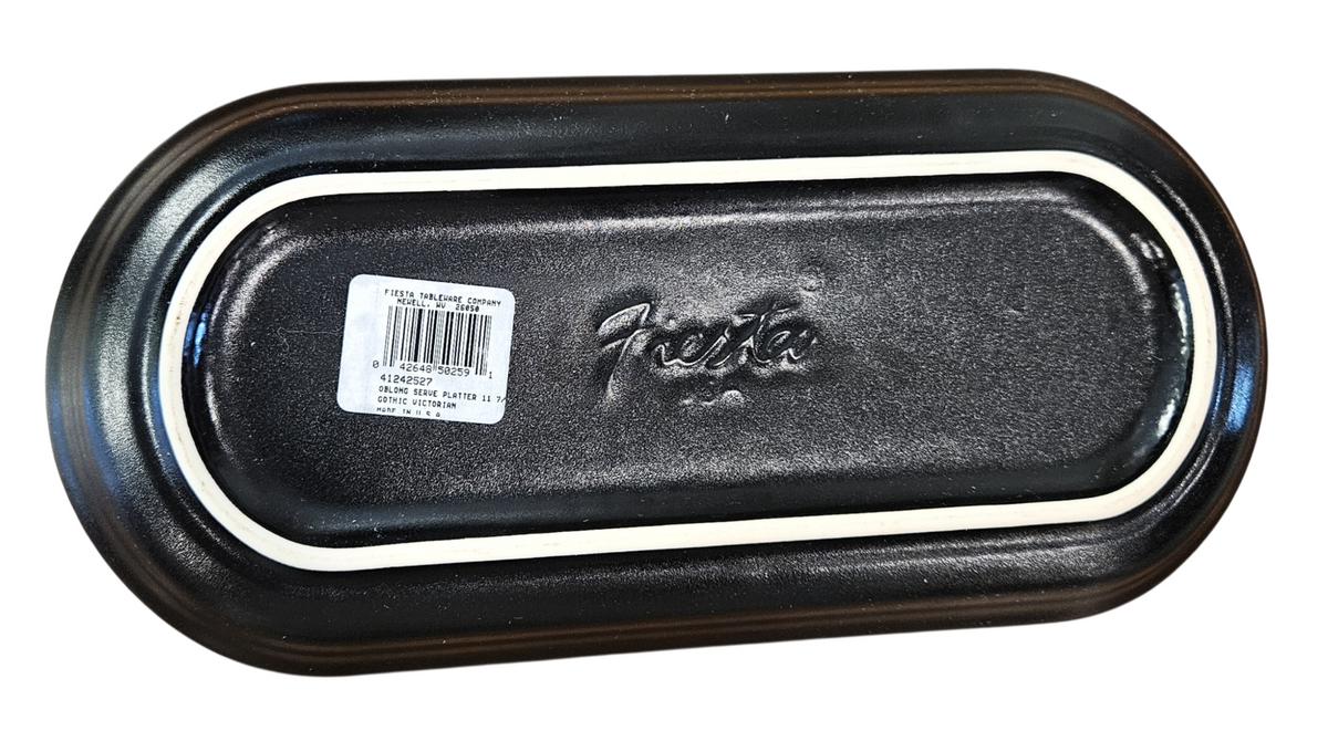 This is a Fiesta Fiestaware Bread Tray featuring the Gothic Victorian decal on Foundry/Black. lead-free, Post 1986, Retired Decal Limited Production Color Skull Halloween Rosebud Butterfly
