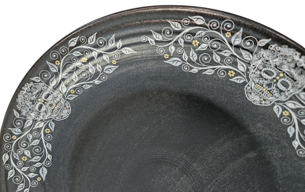 This is Fiesta fiestware Classic Chop Plate featuring the Skull & Vine border decal on black/foundry. Lead free, post 1986,  retired decal, limited production color, Halloween
