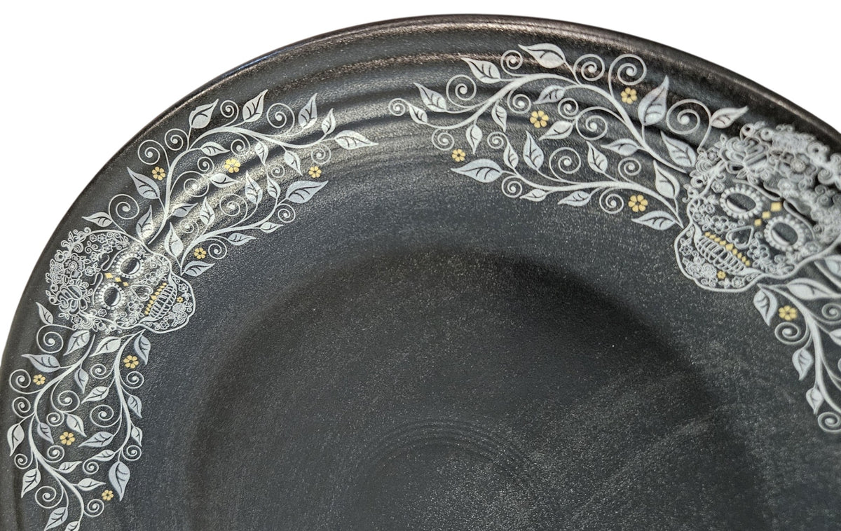 This is Fiesta fiestware Classic Chop Plate featuring the Skull & Vine border decal on black/foundry. Lead free, post 1986,  retired decal, limited production color, Halloween

