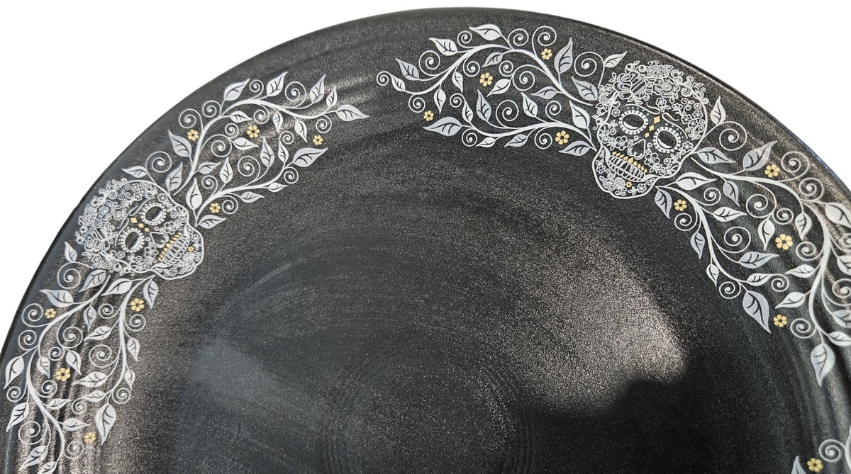 This is Fiesta fiestware Classic Chop Plate featuring the Skull & Vine border decal on black/foundry. Lead free, post 1986,  retired decal, limited production color, Halloween
