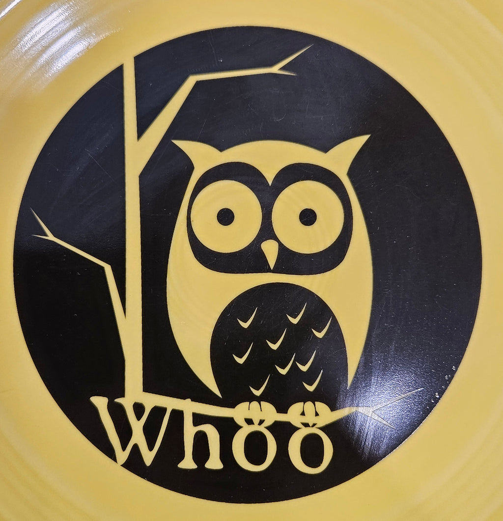 This is a Fiesta fiestaware Classic Luncheon Plate featuring the Whoo Owl decal on sunflower. Lead free, Post 1986, Halloween, Retired Color, Retired Decal.
