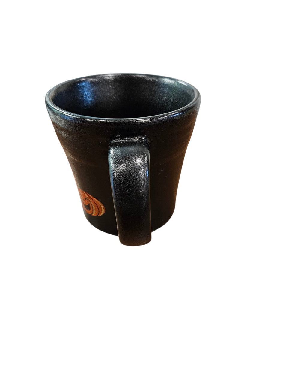This is Fiesta fiestware Tapered Mug featuring the Trio of Happy Pumpkins decal on black/foundry. Lead free, post 1986, retired decal, limited production color, Halloween
