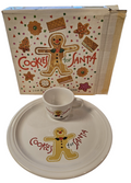 This is a Fiesta Fiestaware Welled Snack Plate and Cup featuring Betty Crocker's original Cookies for Santa Gingerbread decal on White. Post 1986, Lead-free, Decorated, Retired Decal, Christmas. The set went under General Release after Betty Crocker shut down their catalog. The set comes with the original box and packaging.
