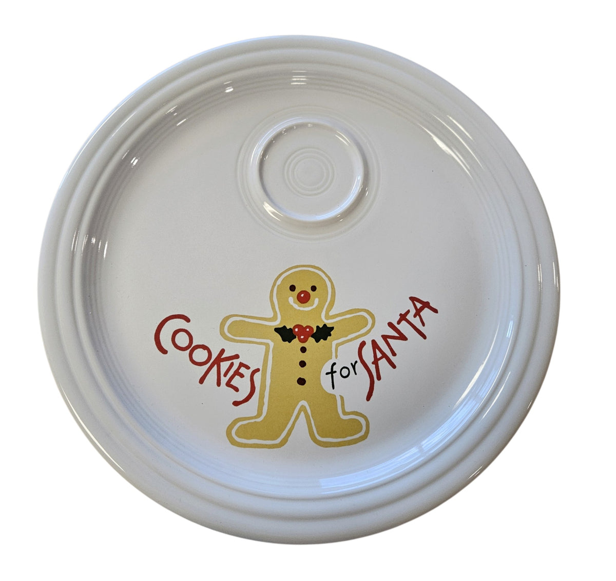 This is a Fiesta Fiestaware Welled Snack Plate and Cup featuring Betty Crocker's original Cookies for Santa Gingerbread decal on White. Post 1986, Lead-free, Decorated, Retired Decal, Christmas. The set went under General Release after Betty Crocker shut down their catalog. The set comes with the original box and packaging.

