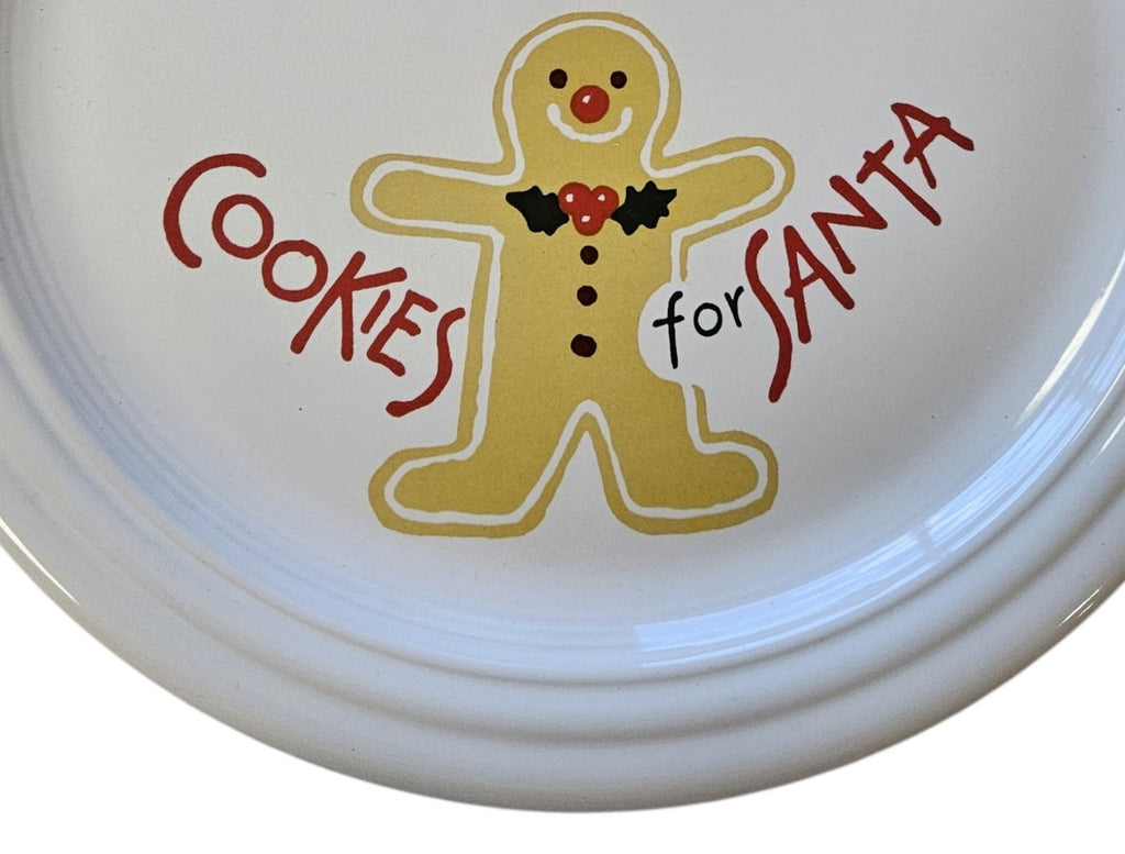 This is a Fiesta Fiestaware Welled Snack Plate and Cup featuring Betty Crocker's original Cookies for Santa Gingerbread decal on White. Post 1986, Lead-free, Decorated, Retired Decal, Christmas. The set went under General Release after Betty Crocker shut down their catalog. The set comes with the original box and packaging.
