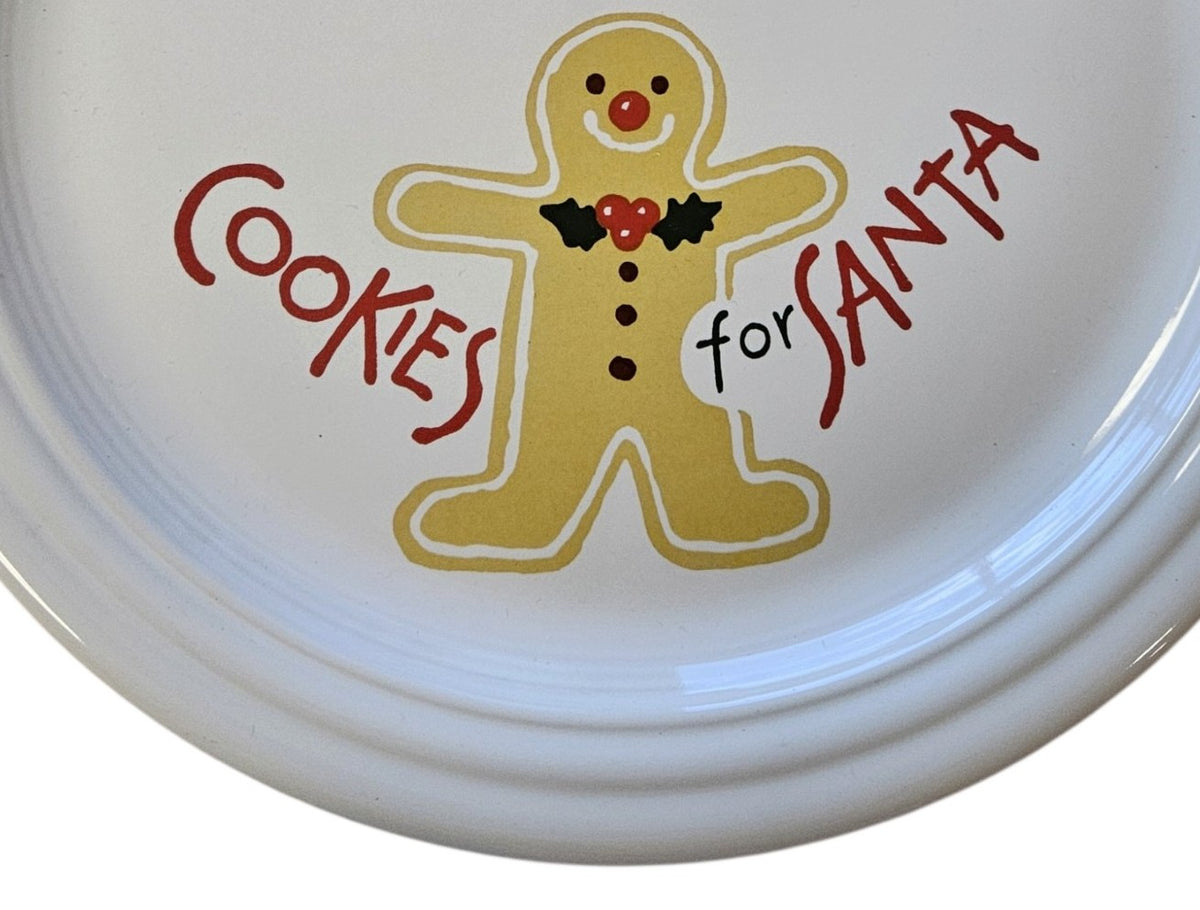 This is a Fiesta Fiestaware Welled Snack Plate and Cup featuring Betty Crocker's original Cookies for Santa Gingerbread decal on White. Post 1986, Lead-free, Decorated, Retired Decal, Christmas. The set went under General Release after Betty Crocker shut down their catalog. The set comes with the original box and packaging.
