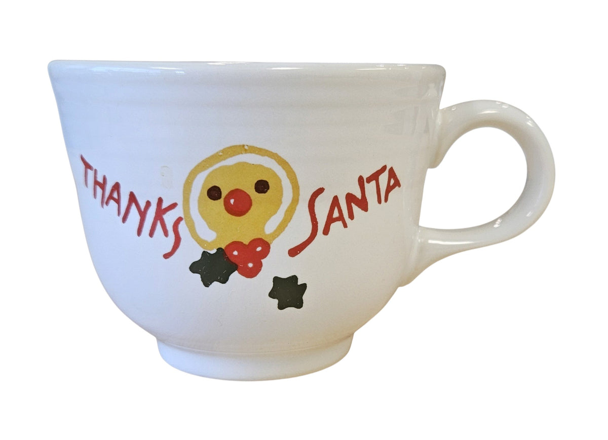 This is a Fiesta Fiestaware Welled Snack Plate and Cup featuring Betty Crocker's original Cookies for Santa Gingerbread decal on White. Post 1986, Lead-free, Decorated, Retired Decal, Christmas. The set went under General Release after Betty Crocker shut down their catalog. The set comes with the original box and packaging.

