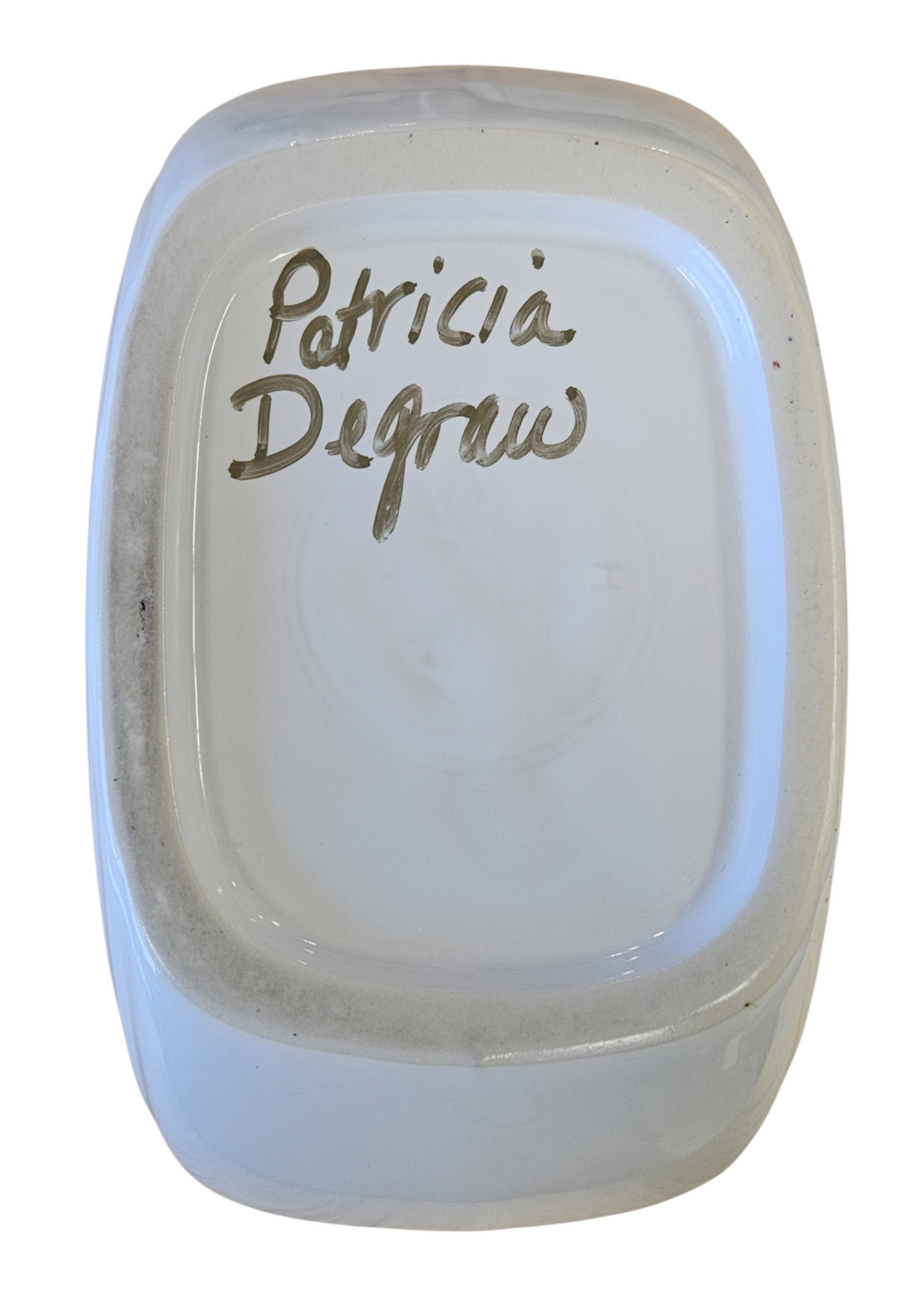 This is a Fiesta Fiestaware Large Disk Pitcher featuring hand-painted artwork by Patricia Degraw on white. The artwork is reflective of Christmas and the Holidays with reds and greens paint hues, holly and berries and a partial mandala pattern. Decorated, Post-1986, Lead-Free
