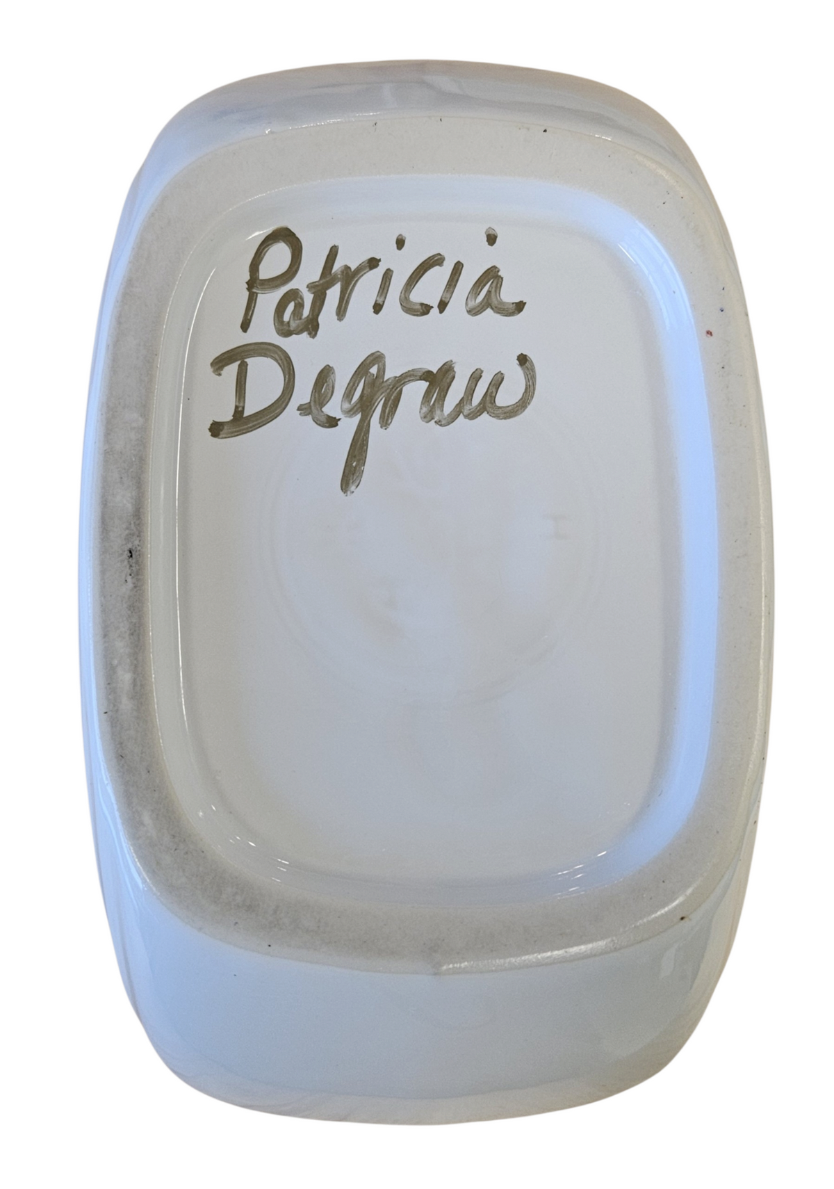 This is a Fiesta Fiestaware Large Disk Pitcher featuring hand-painted artwork by Patricia Degraw on white. The artwork is reflective of Christmas and the Holidays with reds and greens paint hues, holly and berries and a partial mandala pattern. Decorated, Post-1986, Lead-Free
