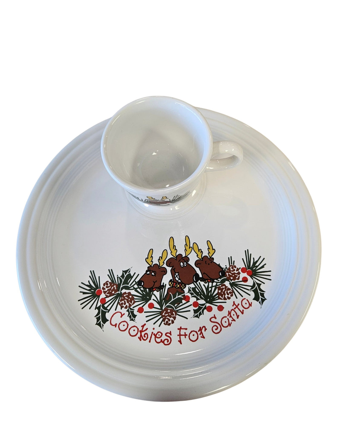 This is a Fiesta Fiestaware Welled Snack Plate and Cup featuring Betty Crocker's original Cookies for Santa Reindeer decal on White. Post 1986, Lead-free, Decorated, Retired Decal, Christmas. The set went under General Release after Betty Crocker shut down their catalog.
