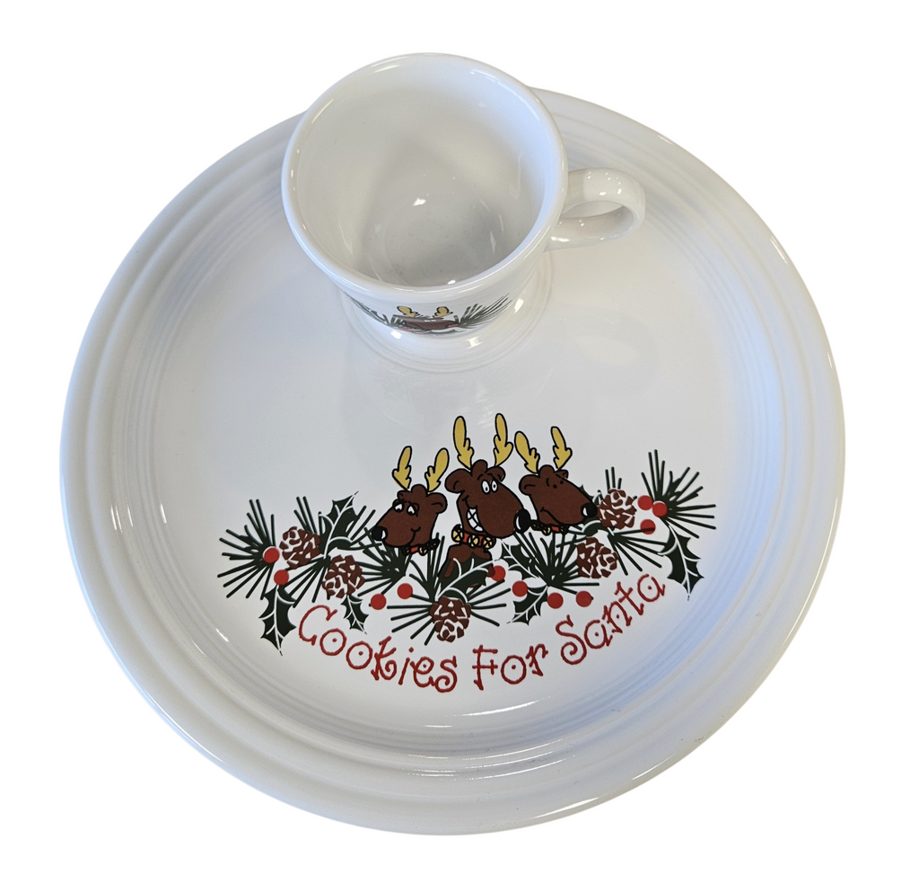This is a Fiesta Fiestaware Welled Snack Plate and Cup featuring Betty Crocker's original Cookies for Santa Reindeer decal on White. Post 1986, Lead-free, Decorated, Retired Decal, Christmas. The set went under General Release after Betty Crocker shut down their catalog.
