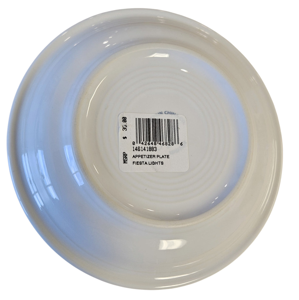 This is a Fiesta Fiestaware Bistro Appetizer Plate featuring the decal sometimes called Bon-Ton's Christmas Lights, String of Lights, or Holiday Lights on White. Post 1986, Lead-free, Christmas, Tree, Decorated, Retired Decal
