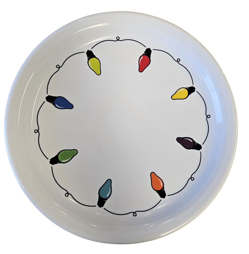 This is a Fiesta Fiestaware Bistro Luncheon Plate featuring the decal sometimes called Bon-Ton's Christmas Lights, String of Lights, or Holiday Lights on White. Post 1986, Lead-free, Christmas, Tree, Decorated, Retired Decal
