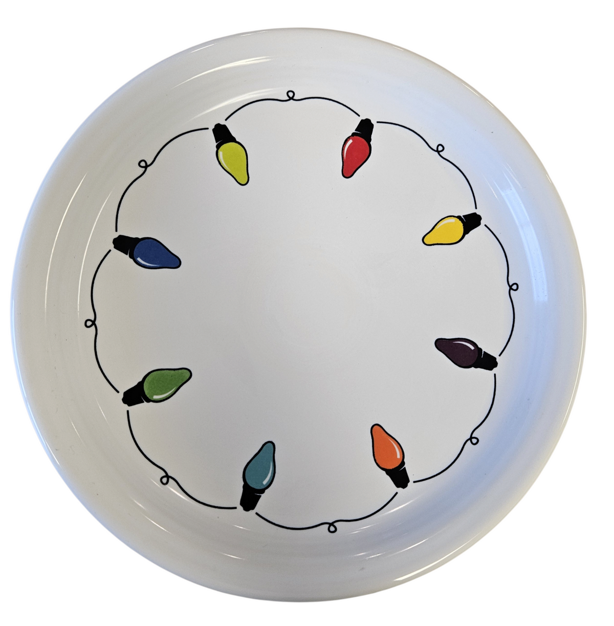 This is a Fiesta Fiestaware Bistro Luncheon Plate featuring the decal sometimes called Bon-Ton's Christmas Lights, String of Lights, or Holiday Lights on White. Post 1986, Lead-free, Christmas, Tree, Decorated, Retired Decal
