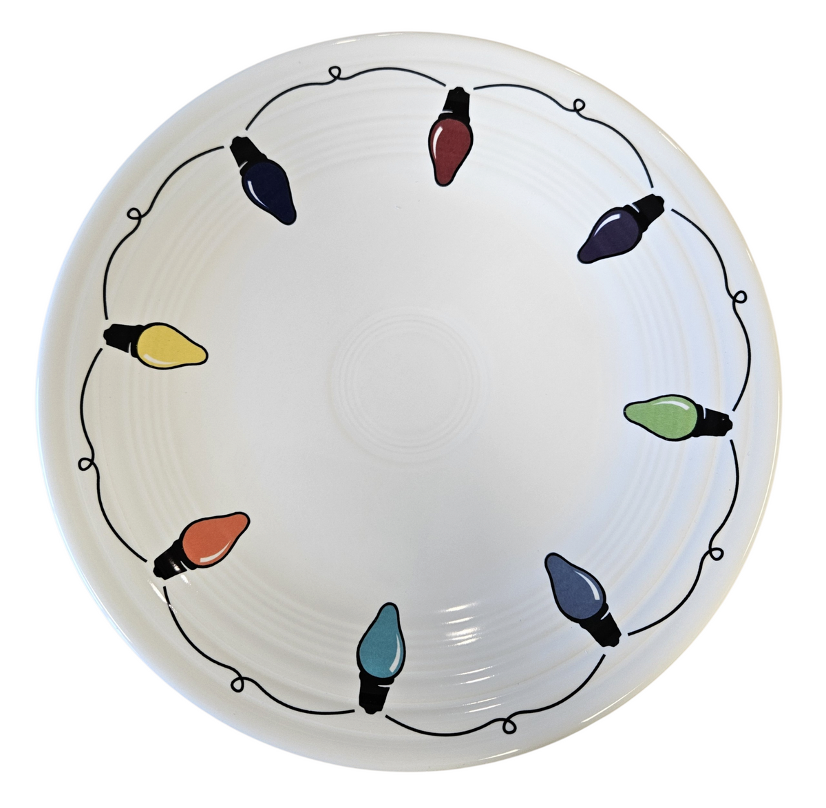 This is a Fiesta Fiestaware Classic Luncheon Plate featuring the decal sometimes called Bon-Ton's Christmas Lights, String of Lights, or Holiday Lights on White. Post 1986, Lead-free, Christmas, Tree, Decorated, Retired Decal
