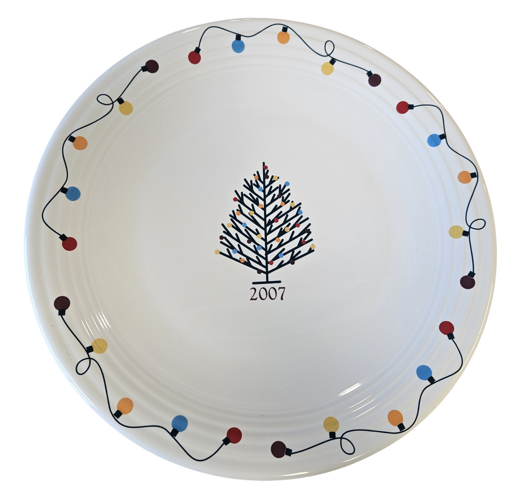 This is a Fiesta Fiestaware Chop Plate featuring JC Penney's exclusive 2007 String of Lights, AKA Light Motif on White. Post 1986, Lead-free, Christmas, Tree, Decorated, Decal
