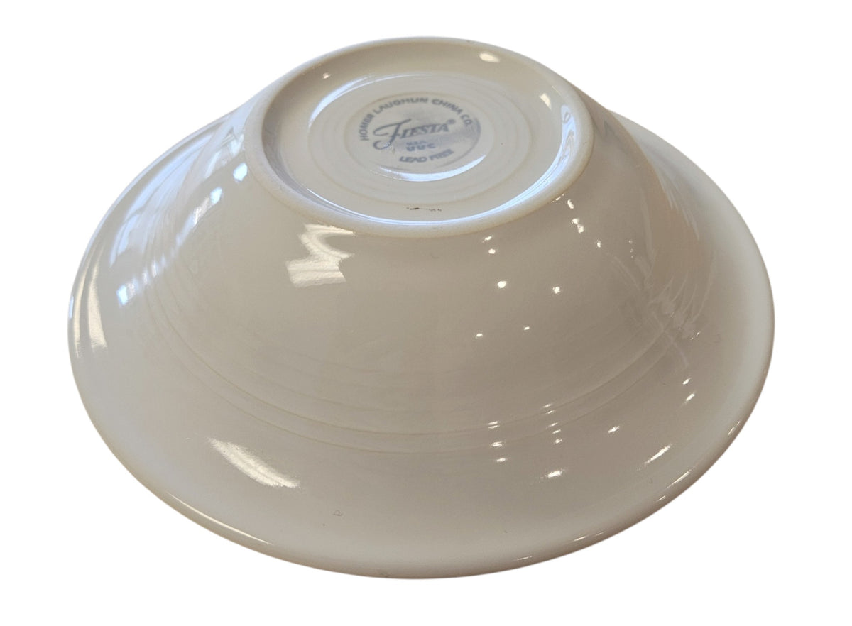 This is a Fiesta Fiestaware Stacking Ceral Bowl featuring the decal sometimes called Bon-Ton's Christmas Lights, String of Lights, or Holiday Lights on White. Post 1986, Lead-free, Christmas, Tree, Decorated, Retired Decal
