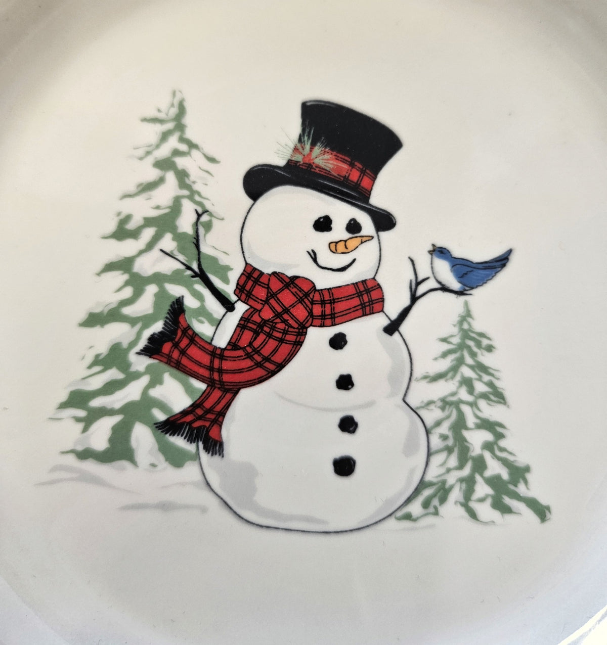 This is a Fiesta Fiestaware Bistro Appetizer Plate featuring the Snowman decal on White. Post 1986, Lead-free, Decorated, Christmas
