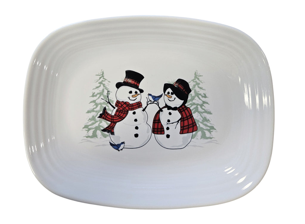 This is a Fiesta Fiestaware Rectangular Platter featuring the Snow Couple decal on White. Post 1986, Lead-free, Decorated, Christmas
