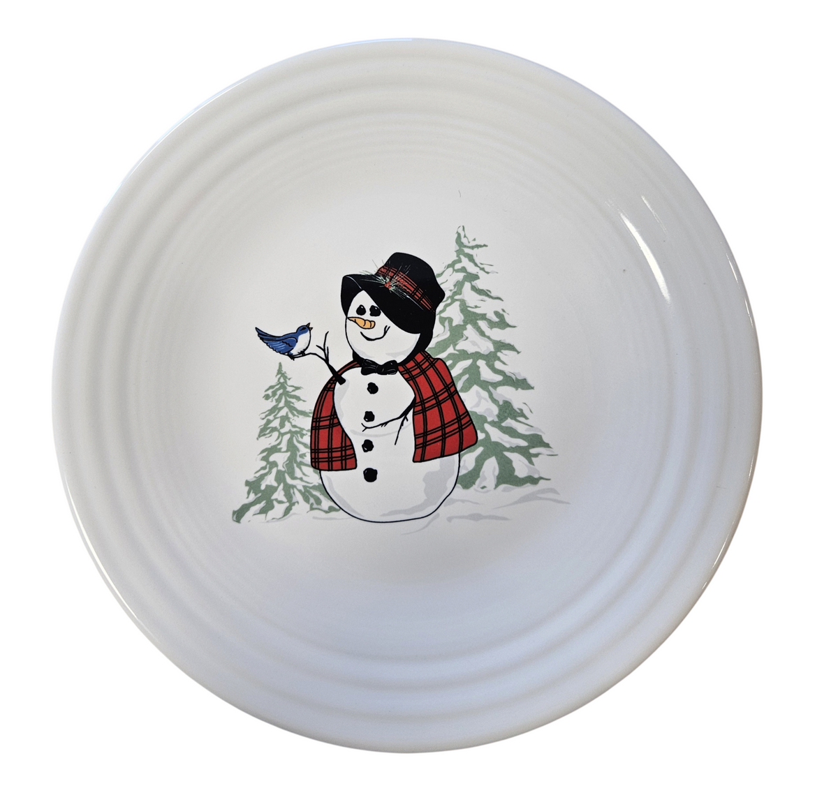 This is a Fiesta Fiestaware Classic Luncheon Plate featuring the Snowlady decal on White. Post 1986, Lead-free, Decorated, Christmas
