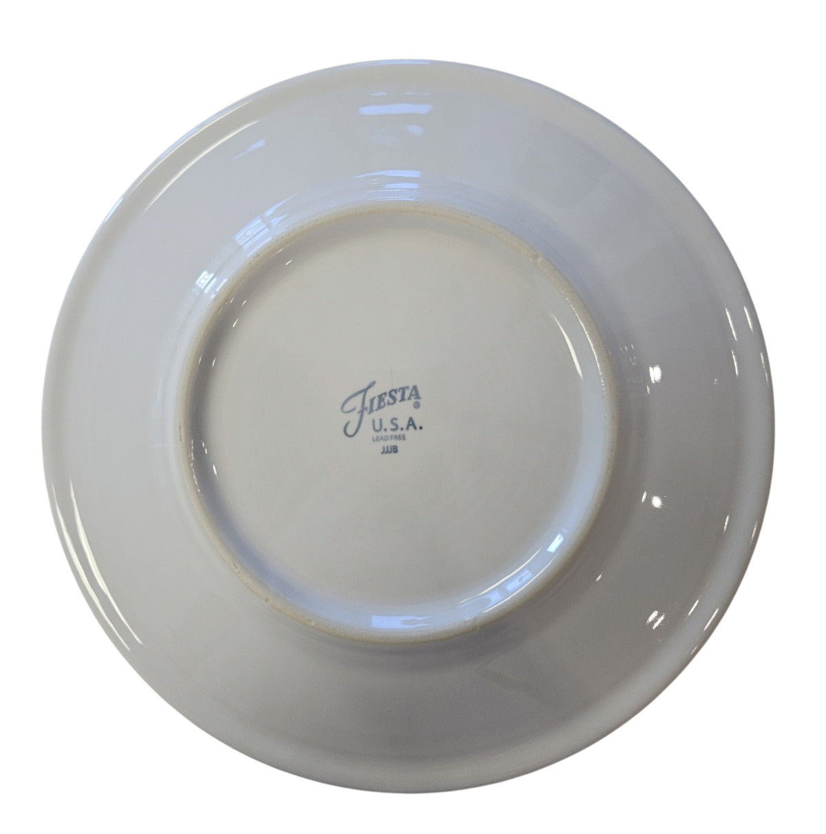 This is a Fiesta Fiestaware Classic Luncheon Plate featuring the Snowlady decal on White. Post 1986, Lead-free, Decorated, Christmas
