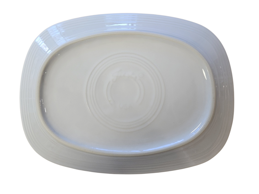 This is a Fiesta Fiestaware Rectangular Platter featuring the original Bed, Bath & Beyond Holiday Camper decal on White. Post 1986, Lead-free, Christmas, Camper, Decorated, Retired Decal, Holiday

