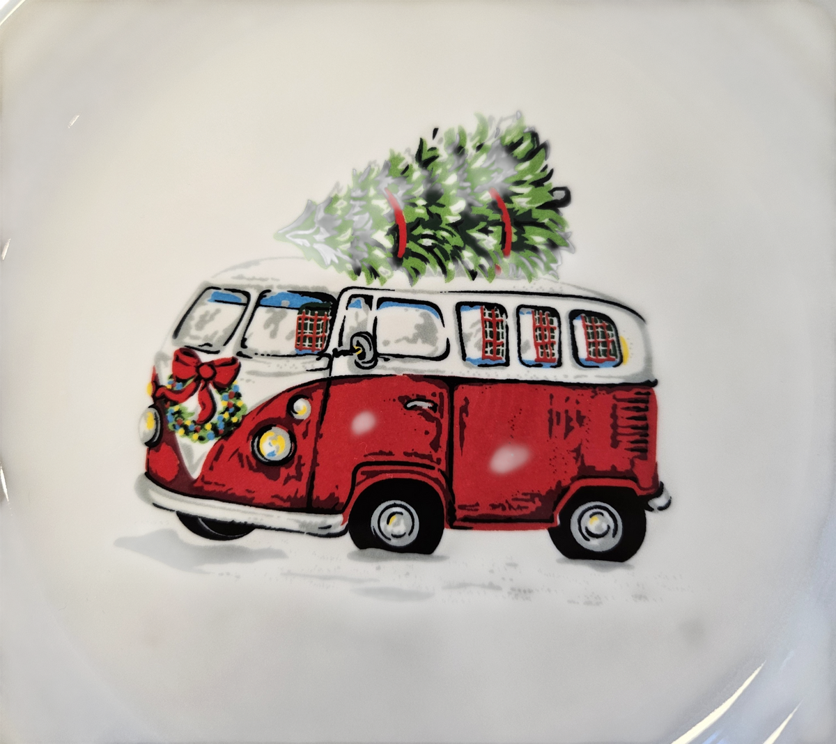 This is a Fiesta Fiestaware Bistro Salad Plate featuring the original Bed, Bath & Beyond Holiday Bus decal on White. Post 1986, Lead-free, Christmas, VW Bus, Decorated, Retired Decal, Holiday
