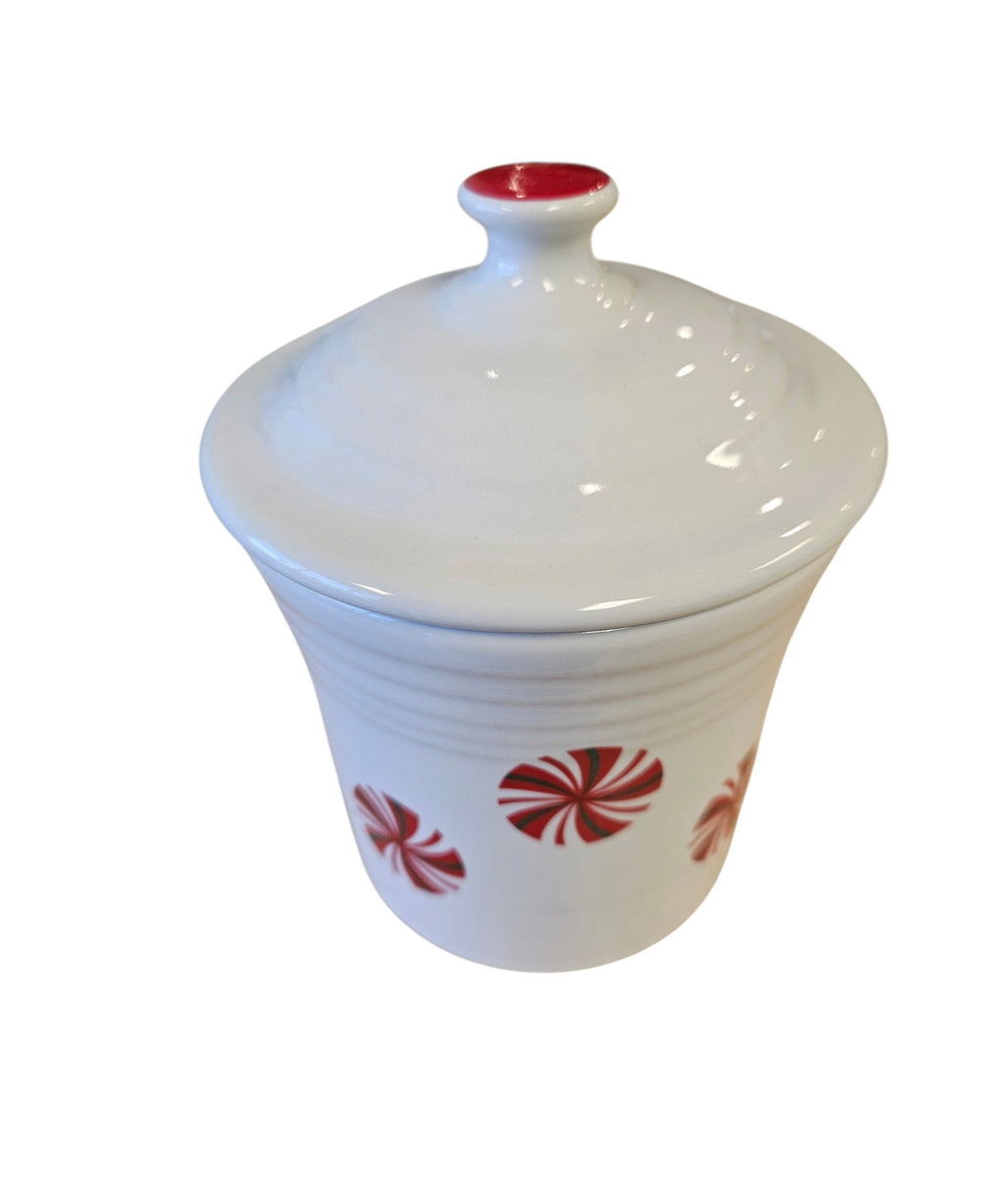 This is a Fiesta Fiestaware Jam Jar/Mini Canister featuring FTCCO's Peppermint decal on White. Post 1986, Lead-free, Decorated, Christmas, Original Betty Crocker Peppermint decal brought back to life by FTCCO.
