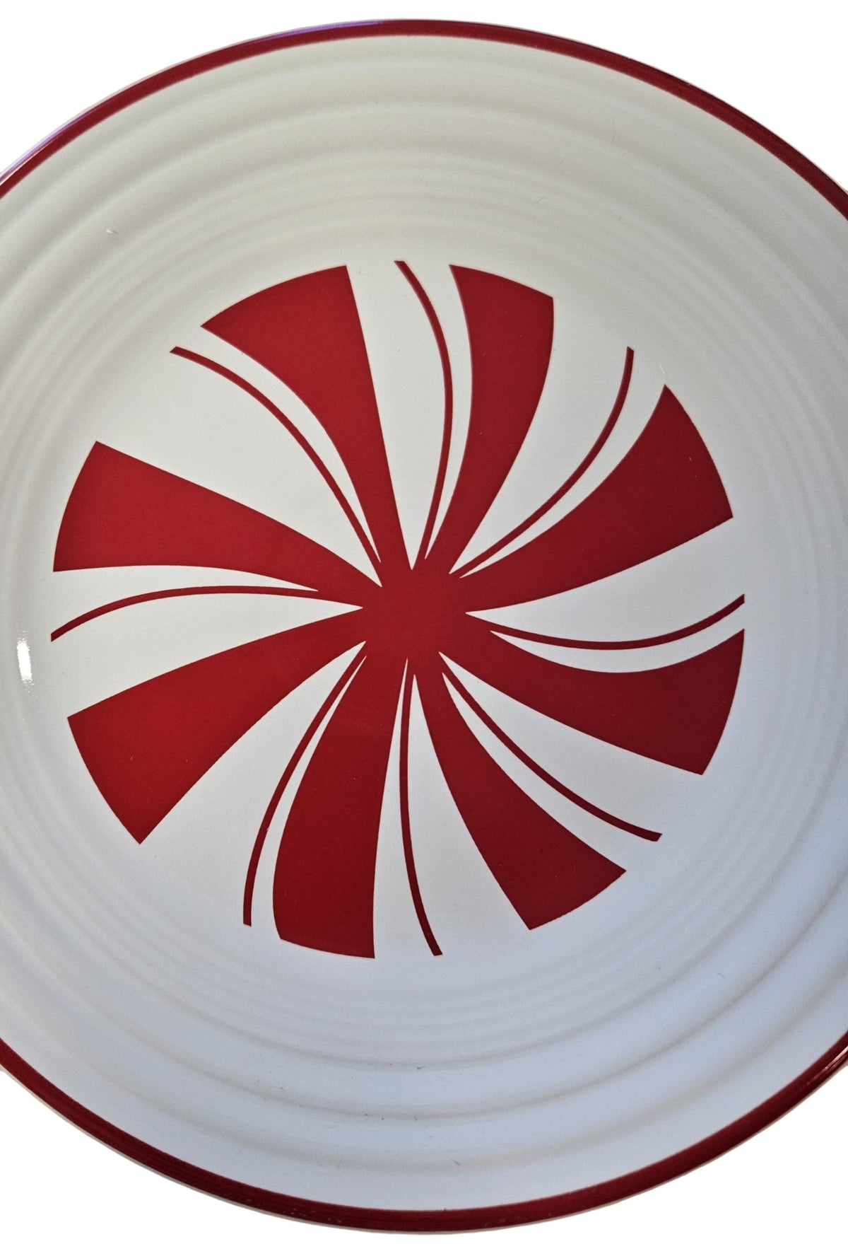 This is a Fiesta Fiestaware Classic Luncheon Plate featuring Bon-Ton's Peppermint decal on White. Post 1986, Lead-free, Decorated, Retired Decal, Christmas
