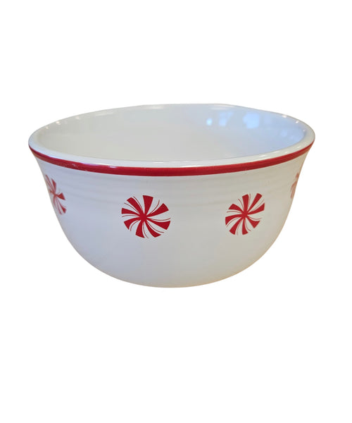 This is a Fiesta Fiestaware Gusto Bowl featuring Bon-Ton's Peppermint decal on White. Post 1986, Lead-free, Decorated, Retired Decal, Christmas

