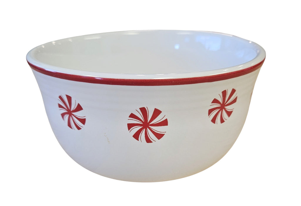 This is a Fiesta Fiestaware Gusto Bowl featuring Bon-Ton's Peppermint decal on White. Post 1986, Lead-free, Decorated, Retired Decal, Christmas
