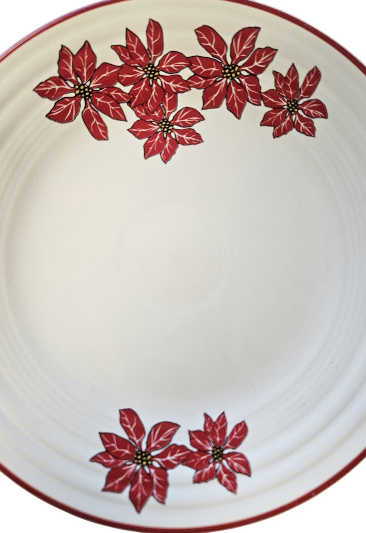 This is a Fiesta Fiestaware Classic Luncheon Plate featuring the Belk's Poinsettia decal on White. Post 1986, Lead-free, Christmas, Flower Decorated, Retired Decal
