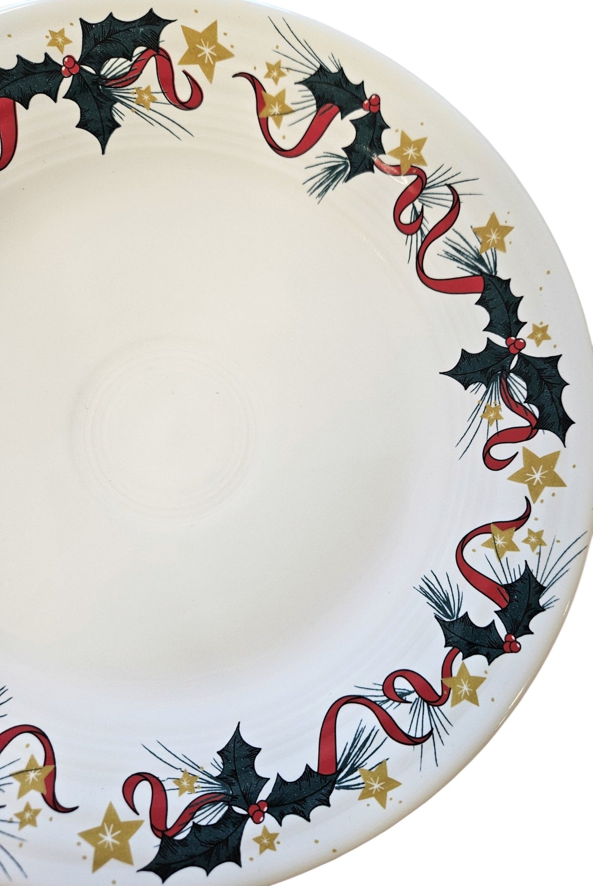 This is a Fiesta Fiestaware Classic Luncheon Plate featuring Dillard's Holly and Stars decal on White. Post 1986, Lead-free, Decorated, Retired Decal, Christmas
