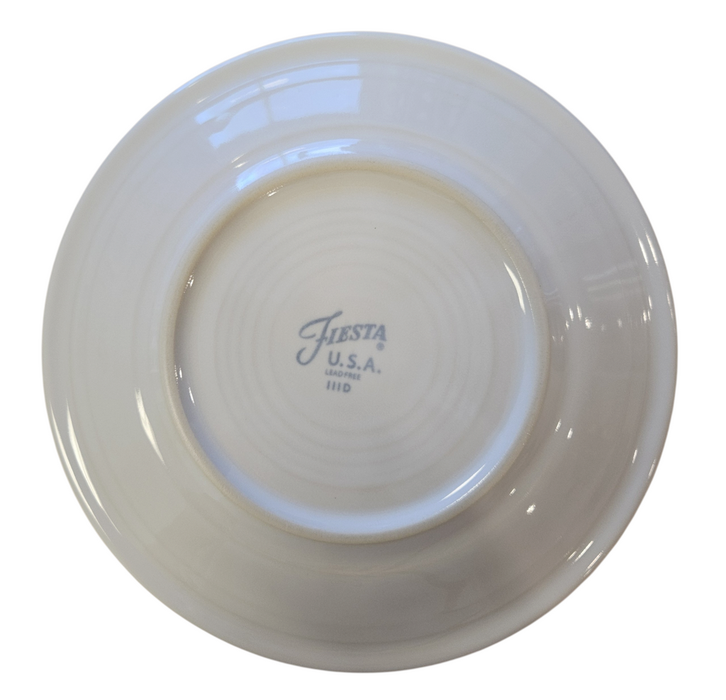 This is a Fiesta Fiestaware Classic Salad Plate featuring Everything Kitchen's exclusive Christmas Whimsey decal  on White. Post 1986, Lead-free, Christmas, Tree, Decorated, Retired Decal, Santa, Gift Bag
